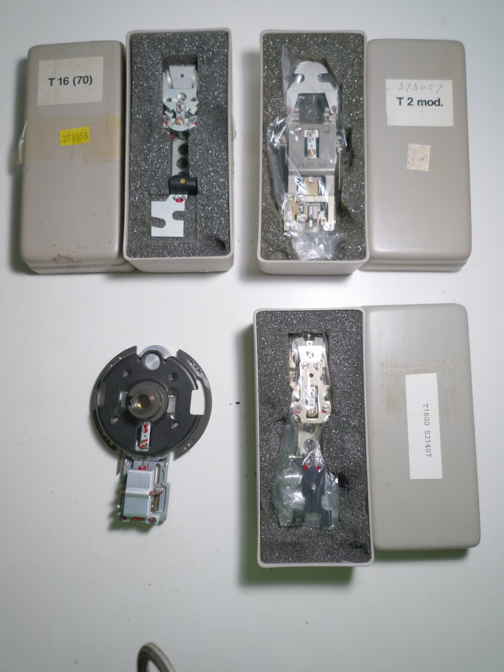 Optical instrument compensators